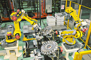 Assembly of automatic tool changers
